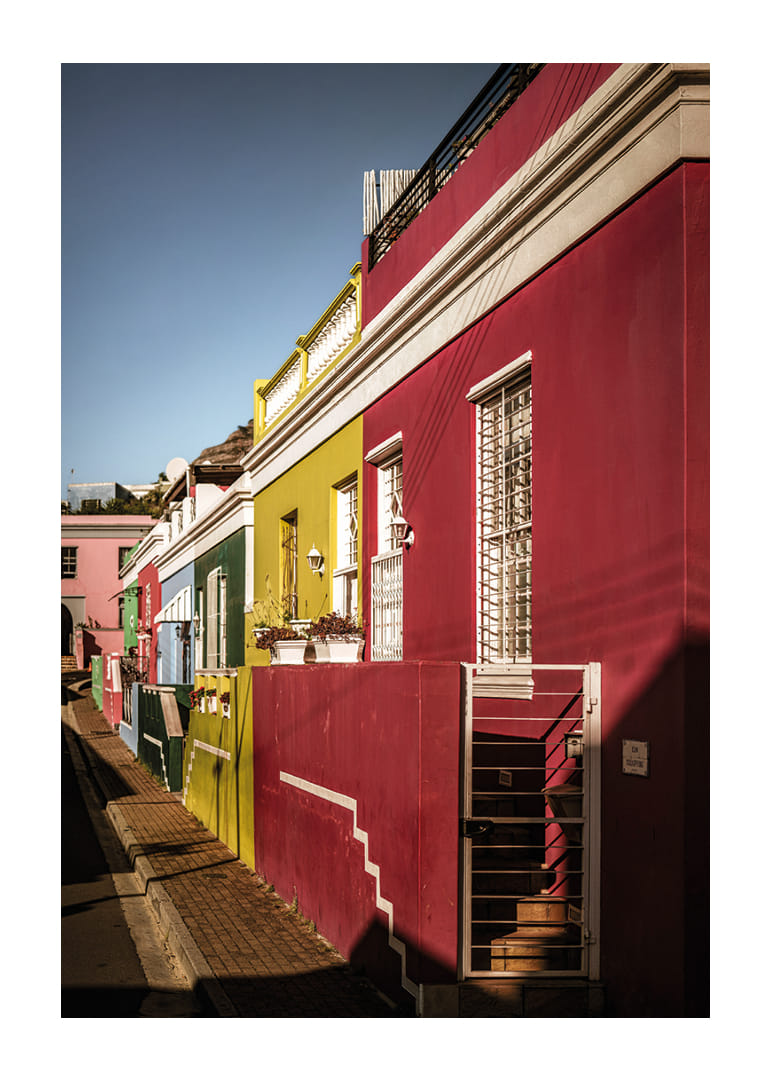 Colorful houses in the sunlight create a vibrant atmosphere.-12