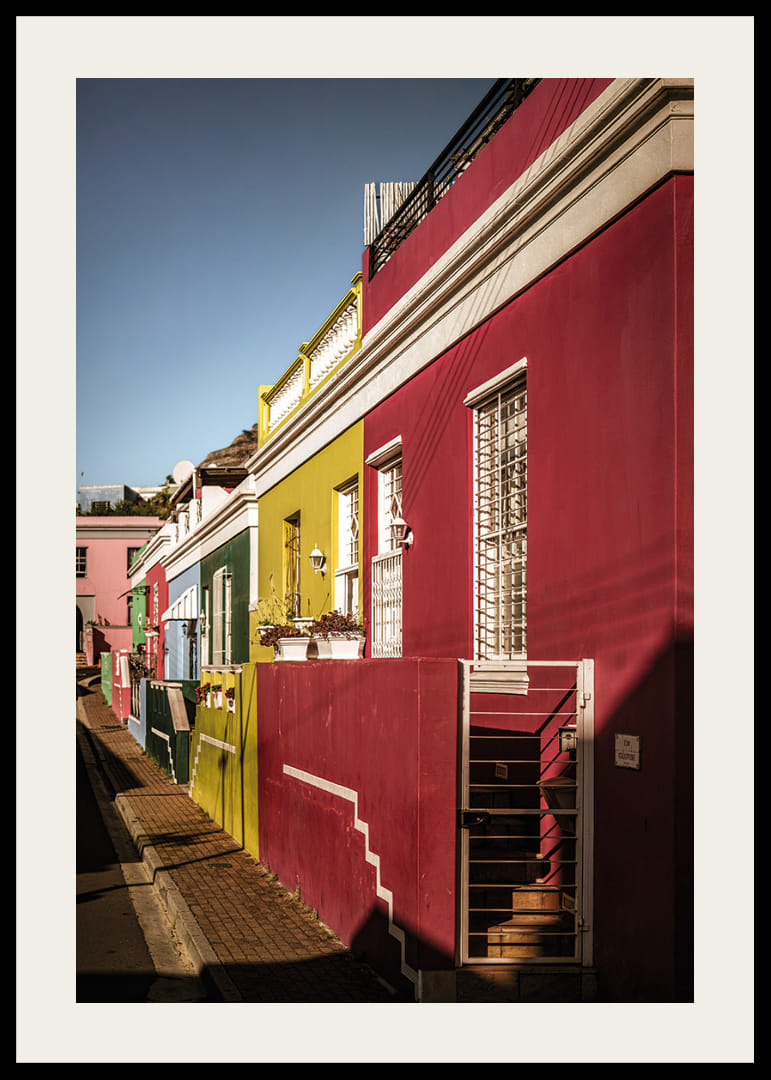 Colorful houses in the sunlight create a vibrant atmosphere.-12