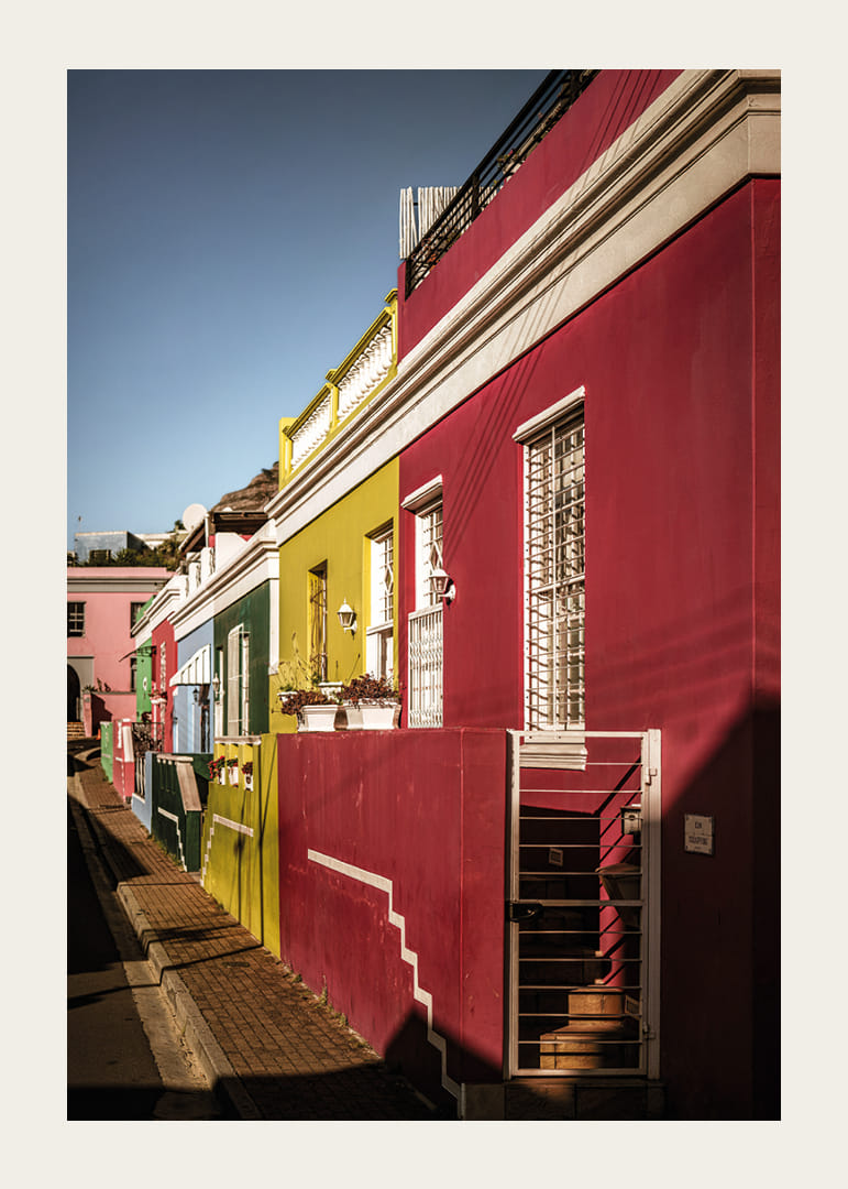 Colorful houses in the sunlight create a vibrant atmosphere.-12
