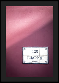 Elegant purple wall with charming street name sign.-0
