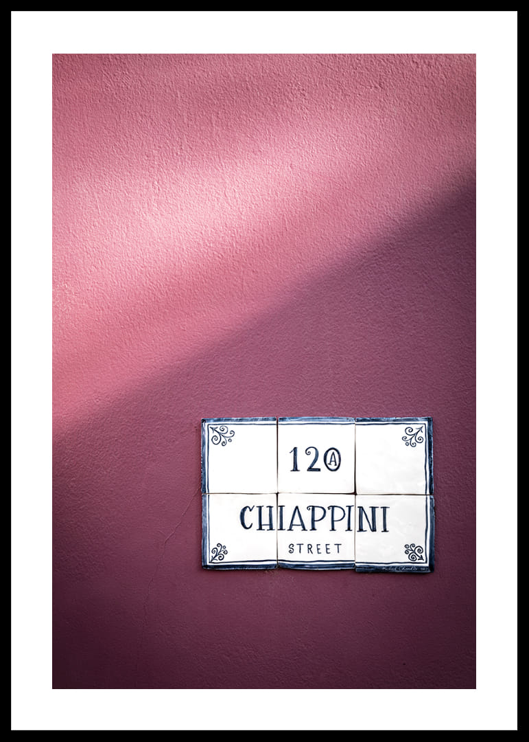 Elegant purple wall with charming street name sign.-12