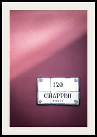 Elegant purple wall with charming street name sign.-4