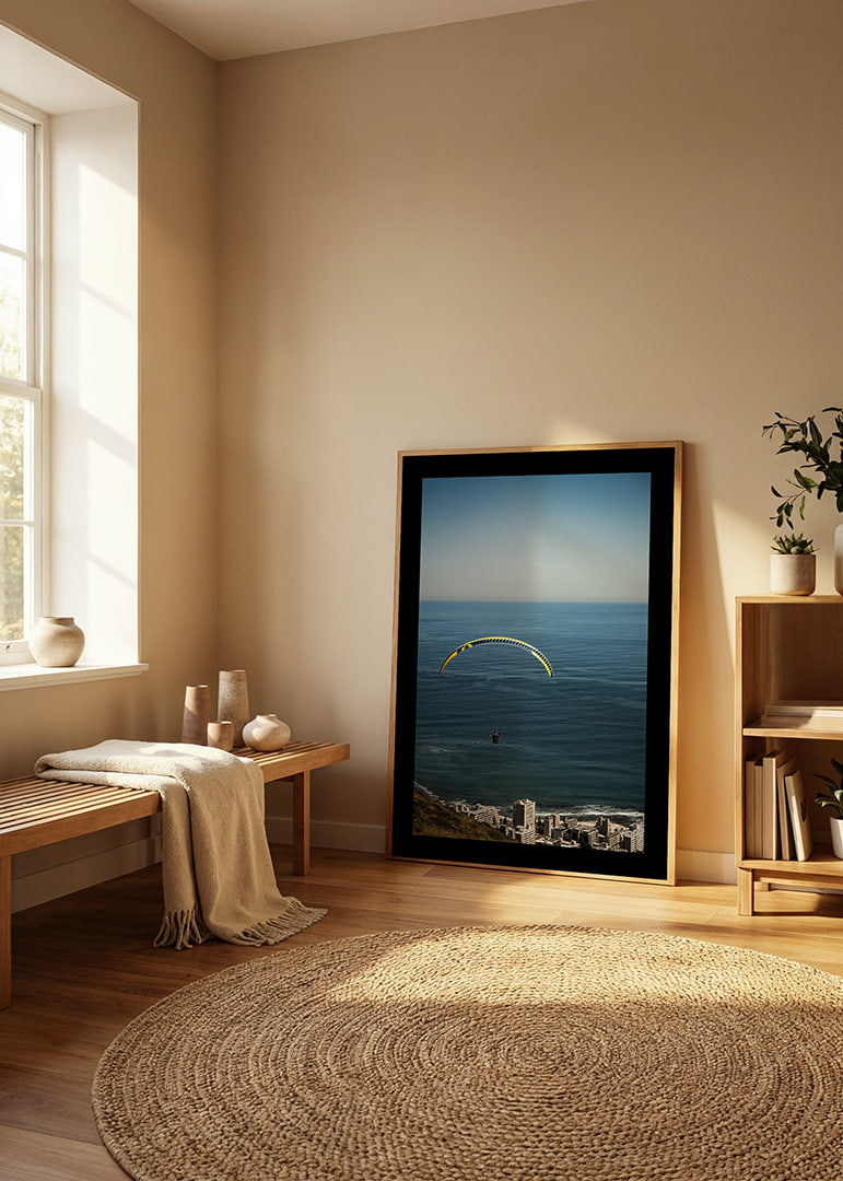 A paraglider soars majestically over the sea and the city.-12