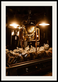Sparkling mask in warm light above coffee cups.-2