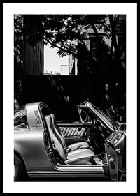 A classic Porsche 911 reflects timeless elegance and sophisticated charm.-0