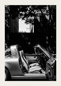 A classic Porsche 911 reflects timeless elegance and sophisticated charm.-3