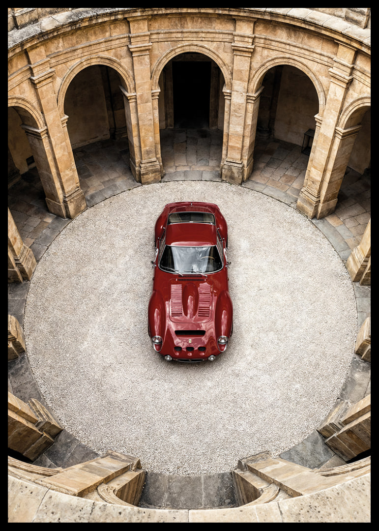 A red classic Ferrari 250 GTO in a majestic courtyard.-12