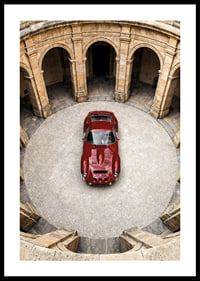 A red classic Ferrari 250 GTO in a majestic courtyard.-0
