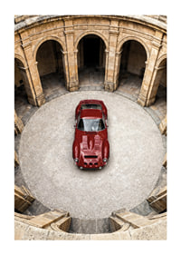 A red classic Ferrari 250 GTO in a majestic courtyard.-1