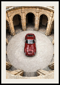 A red classic Ferrari 250 GTO in a majestic courtyard.-2