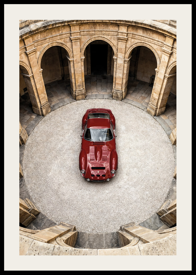 A red classic Ferrari 250 GTO in a majestic courtyard.-12