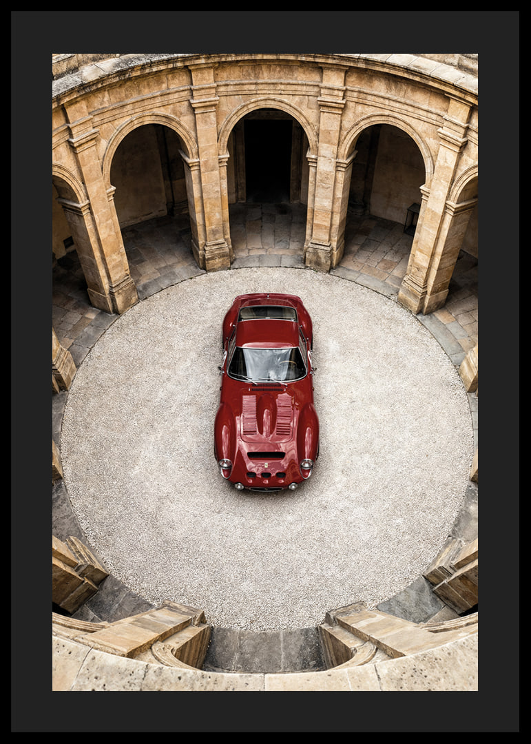 A red classic Ferrari 250 GTO in a majestic courtyard.-12