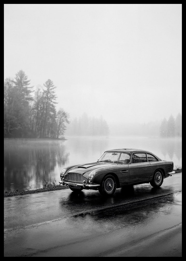 A classic Aston Martin DB5 by a foggy seaway exudes calm and nostalgia.-12