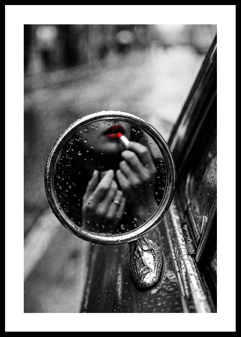 Raindrops on the mirror embrace a moment of seductive beauty.-12