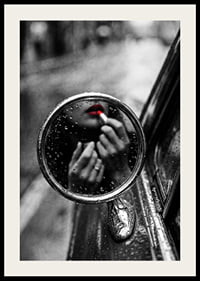 Raindrops on the mirror embrace a moment of seductive beauty.-2