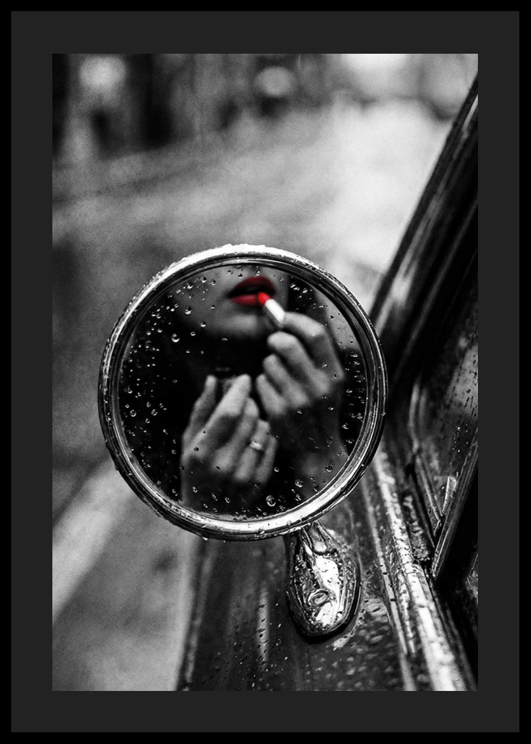 Raindrops on the mirror embrace a moment of seductive beauty.-12