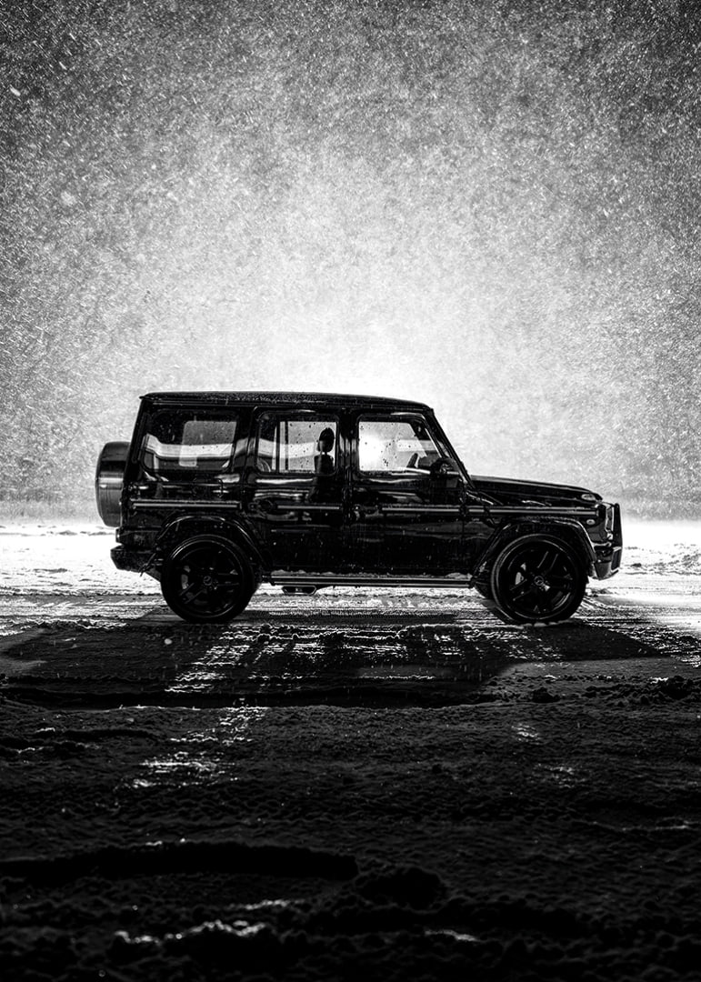A silhouette of Mercedes-Benz, G-Wagon in snow-filled night creates a sense of adventure.-12