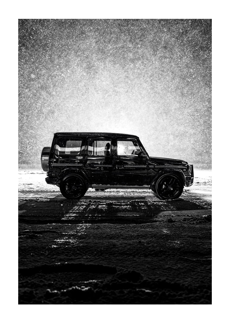 A silhouette of Mercedes-Benz, G-Wagon in snow-filled night creates a sense of adventure.-12
