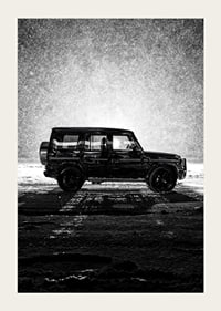 A silhouette of Mercedes-Benz, G-Wagon in snow-filled night creates a sense of adventure.-3