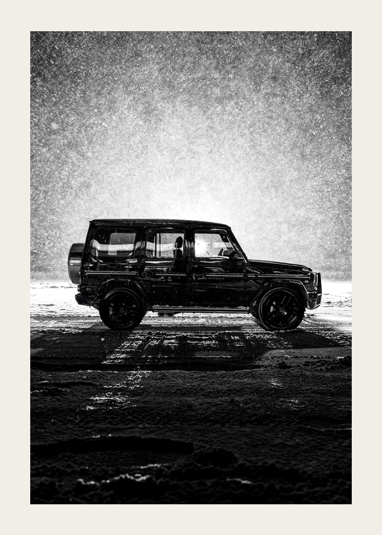 A silhouette of Mercedes-Benz, G-Wagon in snow-filled night creates a sense of adventure.-12