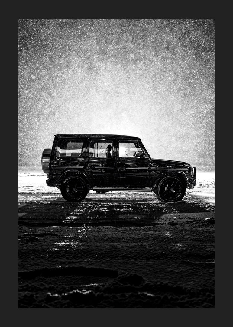 A silhouette of Mercedes-Benz, G-Wagon in snow-filled night creates a sense of adventure.-12