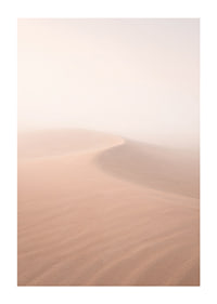 Soft pink sand dunes in a dreamlike desert horizon.-1