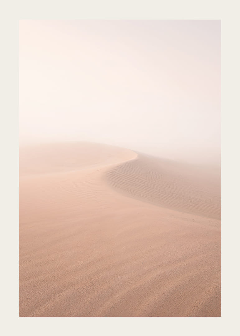 Soft pink sand dunes in a dreamlike desert horizon.-12