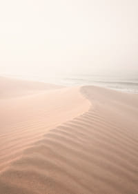 Soft pastel tones with calm sand dunes create tranquility.-7