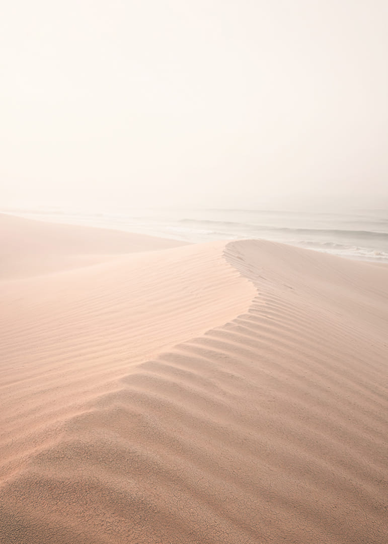 Soft pastel tones with calm sand dunes create tranquility.-12