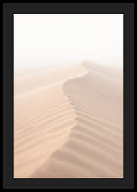A soft wave of sand sweeps through a desolate landscape.-4