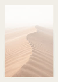 A soft wave of sand sweeps through a desolate landscape.-3