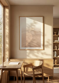 A soft wave of sand sweeps through a desolate landscape.-8