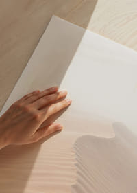 A soft wave of sand sweeps through a desolate landscape.-9