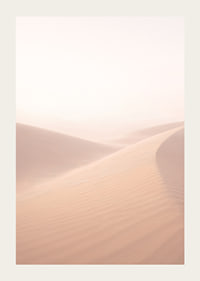 Soft, pink sand dunes create a dreamlike atmosphere.-3