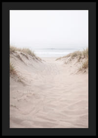 Soft sand leads towards the distant horizon of the sea.-4