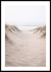 Soft sand leads towards the distant horizon of the sea.-0