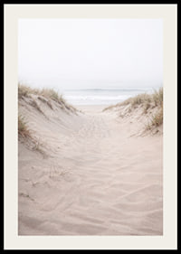 Soft sand leads towards the distant horizon of the sea.-2
