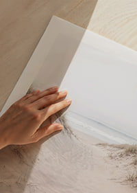 Soft sand leads towards the distant horizon of the sea.-9