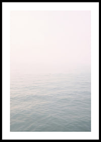 Calm sea view meets bright sky in fog.-0