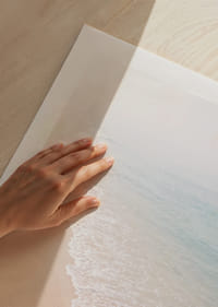 Gentle waves roll in towards the misty coast.-9