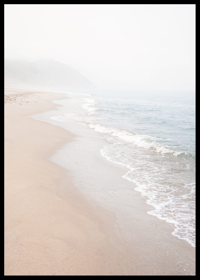 Soft morning mist sweeps over a quiet shoreline.-12