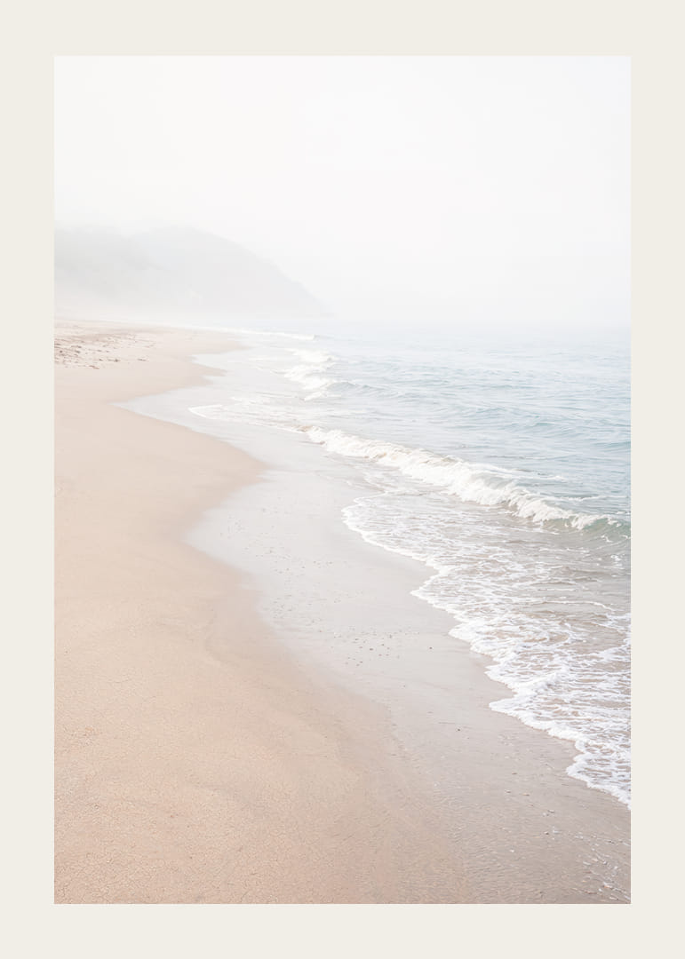 Soft morning mist sweeps over a quiet shoreline.-12