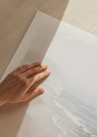 Soft morning mist sweeps over a quiet shoreline.-9