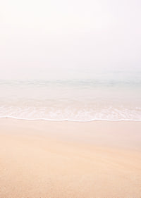 Soft pastel beaches meet the peaceful horizon.-7