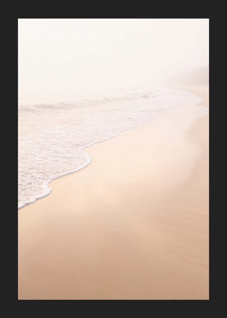 A warm, soft beach in a misty haze creates peace and tranquility.-12