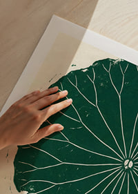 A deep green lotus leaf awakens inner peace and balance.-9
