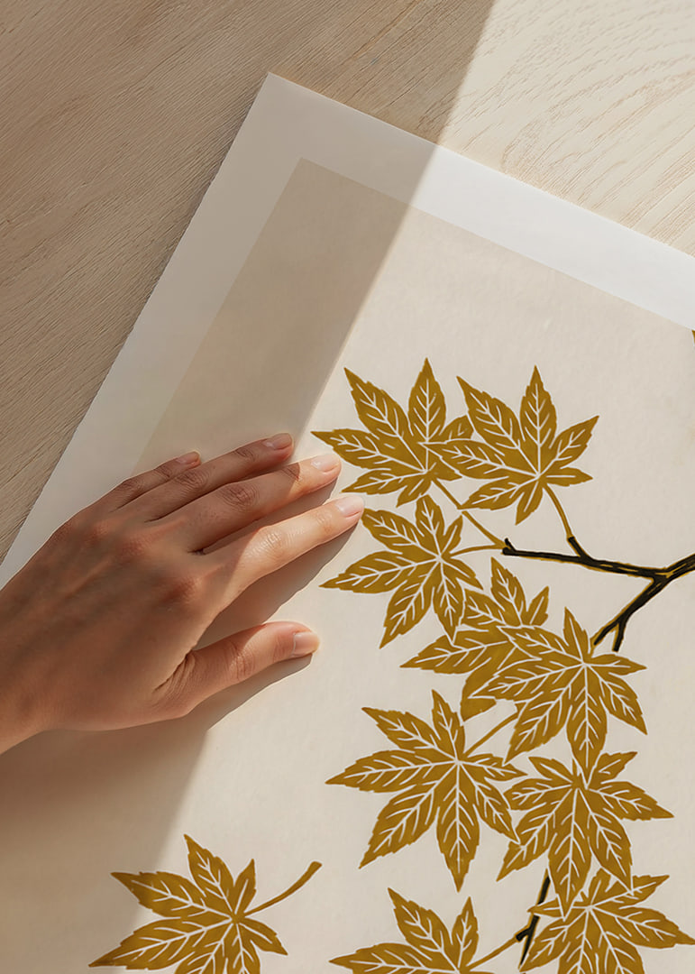 Golden maple leaves float elegantly against a cream-colored background.-12
