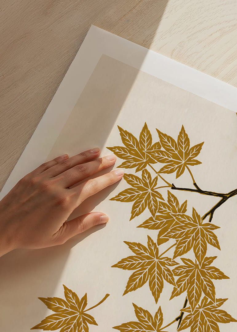 Golden maple leaves float elegantly against a cream-colored background.-12