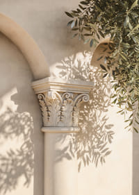 Sun-filled shadows dance over classical architecture.-7