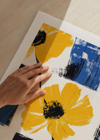 Yellow flowers against blue and white backgrounds create life and energy.-9